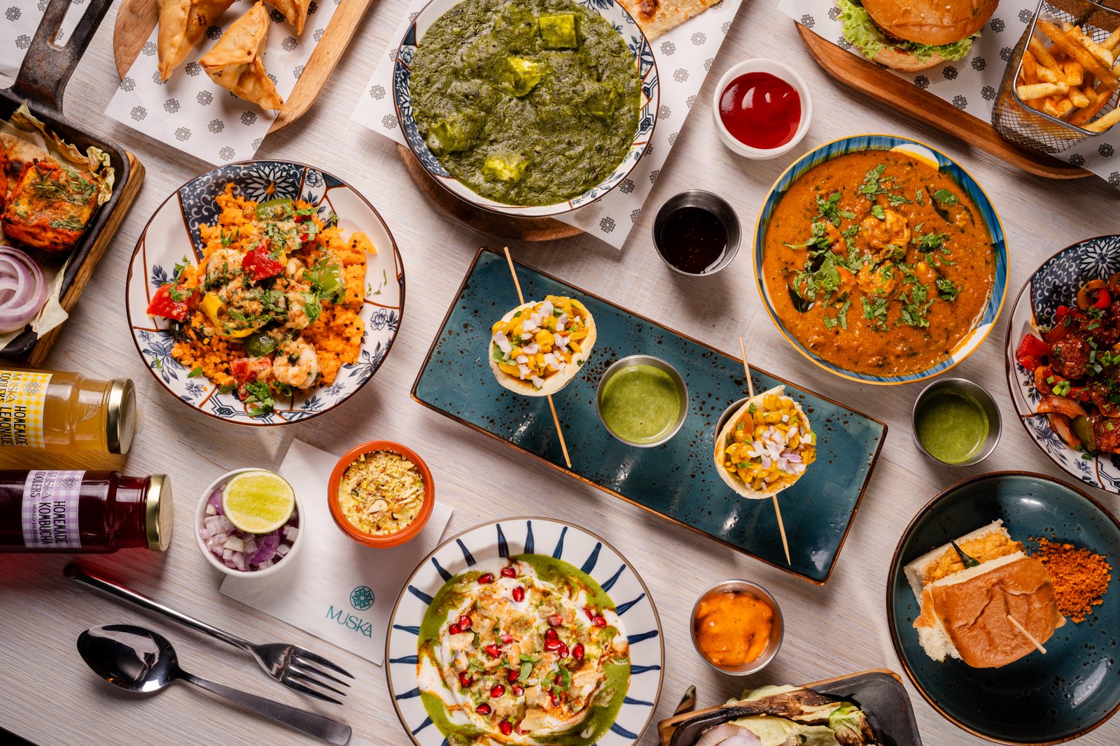 Spread of dishes at Muska KL